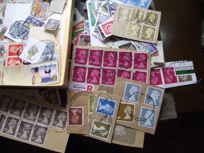 A box with collection of stamps from Great Britain