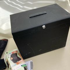 Metal file box , knee supports and window blind could be used to paint on due children or make a banner