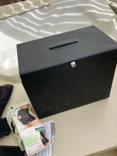 Metal file box , knee supports and window blind could be used to paint on due children or make a banner