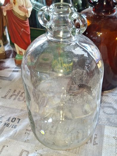 2 Demijohn Jars, Amber and Clear glass,  Stage or Movie Props collectible. Postage Available or Collection