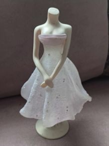 Vintage "The Latest Thing" Figurine