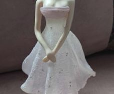 Vintage "The Latest Thing" Figurine