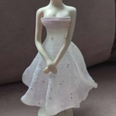 Vintage "The Latest Thing" Figurine
