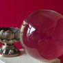 Crystal glass ball on metal lotus flower base. Image 4