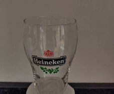 2 half pint Heineken glasses