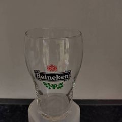 2 half pint Heineken glasses