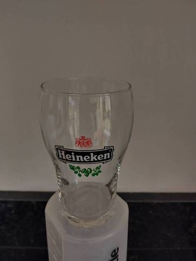 2 half pint Heineken glasses