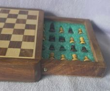 Wooden travel chess set with storage