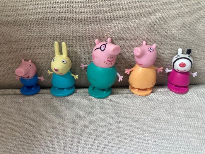 Peppa pig characters and suitcase