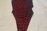 Sexy burgundy bodysuit for thin crossdresser