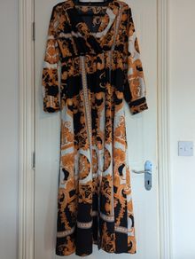 Stunning long sleeve faux wrap floral maxi dress