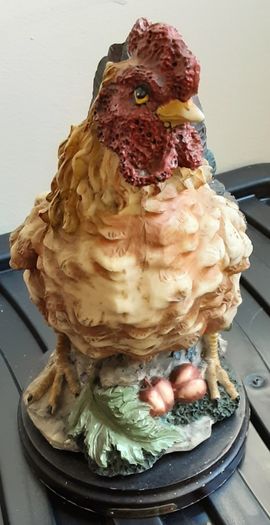 Cockerell and hen plus, around ten or 12 inches tall