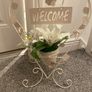White welcome sign on stand, with artificial flower Image 2