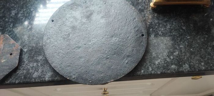 old cast iron sign