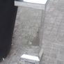 a shops display stand with mirror all round it Image 4