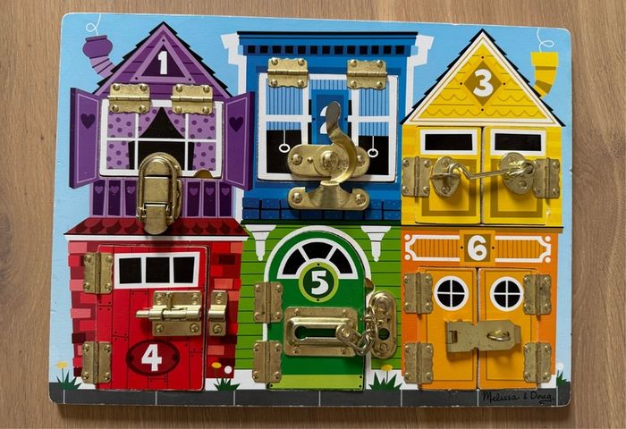 Melissa and Doug latches board