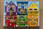 Melissa and Doug latches board
