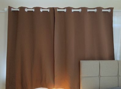 Pair of Brown Blackout Curtains with Eyelets