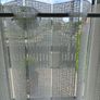 Cream pleated cafe nets and assorted tension rods to suit Image 2