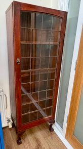 Vintage wooden display cabinet with glass door
