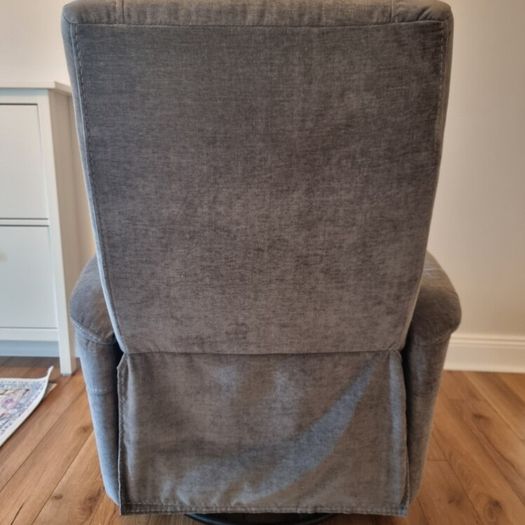 Swivel rocker reclining armchair