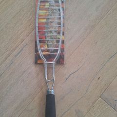 unopened bbq fish holder