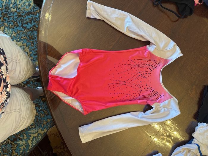 Four leotards for sale