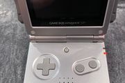 Nintendo Game Boy Advance SP Platinum Silver Mega Bundle - New Battery, USB Charger &amp; 7 Games