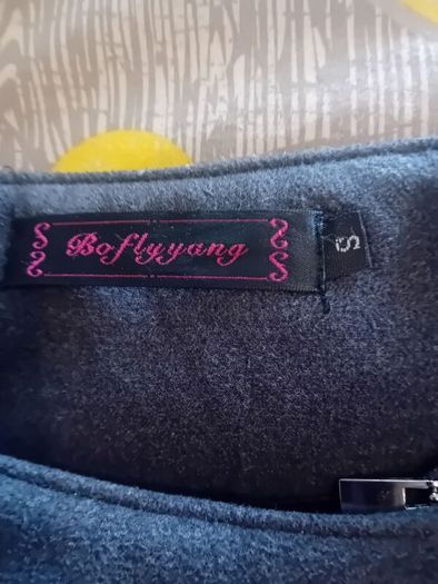 ladies jacket. Padded design. Black with grey material. Size small
