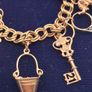 Vintage 9ct yellow gold charm bracelet Image 7