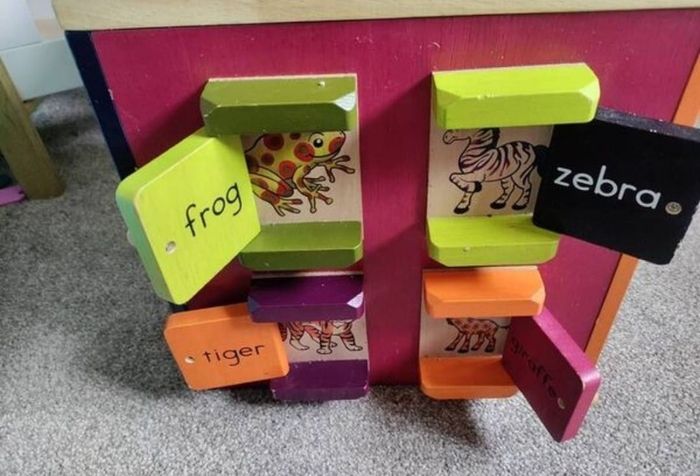 B. toys Zany Zoo Wooden Activity Cube Assortment