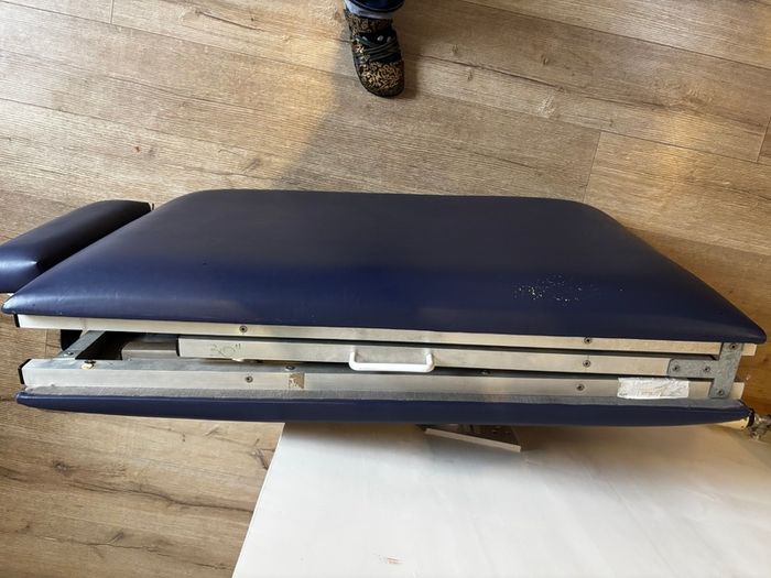 Massage table