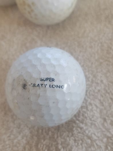 golf ball and tees
