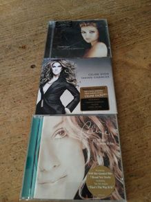 Celine Dion is featured on these CD albums,