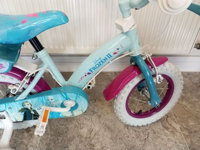 Kids frozen bike size 12 inch wheels.