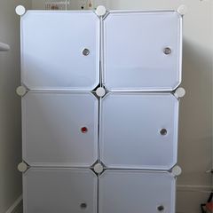 6 cube storage unit with doors.