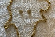 Ladies cream and gold long necklace and earrings