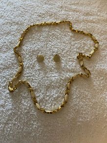Ladies cream and gold long necklace and earrings