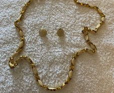 Ladies cream and gold long necklace and earrings