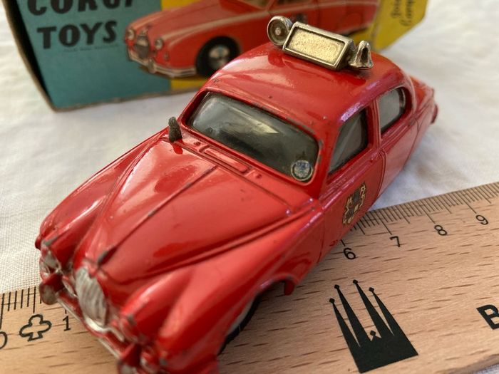 Corgi 213. Jaguar 2.4 Fire Service car. Boxed . Box and model in excellent condition (1959/61)