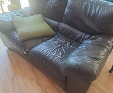 Black leather sofas