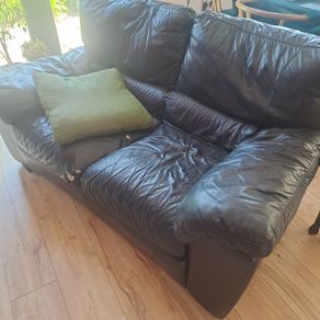 Black leather sofas