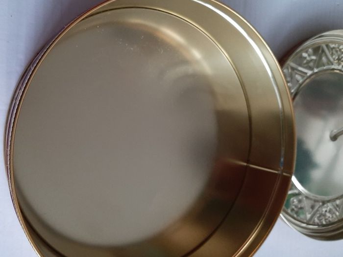 new vintage millennium tin