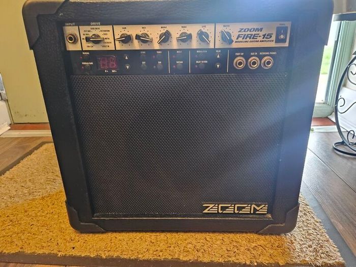 Aria electric guitar with Zoom Fire-15 Amp