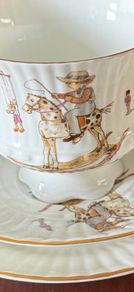 Child's tea set featuring charming illustrations by the German artist Gisela Gottschlich.