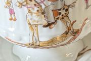 Child's tea set featuring charming illustrations by the German artist Gisela Gottschlich.