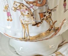 Child's tea set featuring charming illustrations by the German artist Gisela Gottschlich.