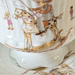 Child's tea set featuring charming illustrations by the German artist Gisela Gottschlich.