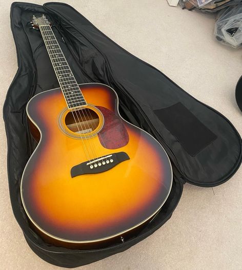 Brunswick acoustic guitar with soft carry case, barely used