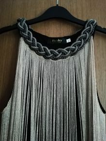 Dress with chain style top and golden threads
